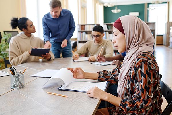 people filing immigration paperwork