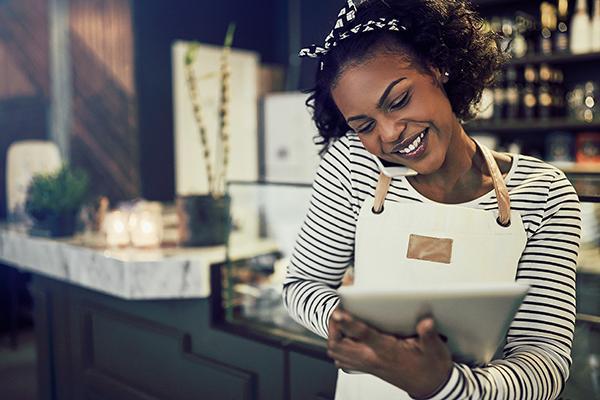 cafe owner on tablet